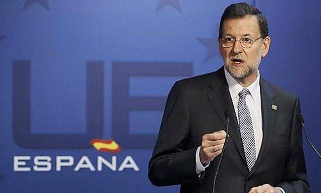 Spains PM Rajoy holds a news conference at the end of a European Union leaders summit in Brussels