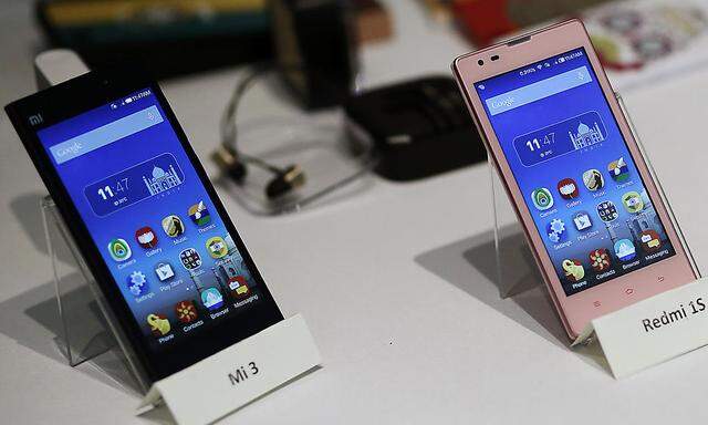 Three models of China´s Xiaomi Mi phones are pictured during their launch in New Delhi