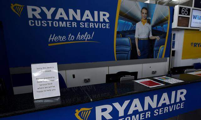 FILE PHOTO: An empty Ryanair customer services desk is seen at Dublin airport in Dublin