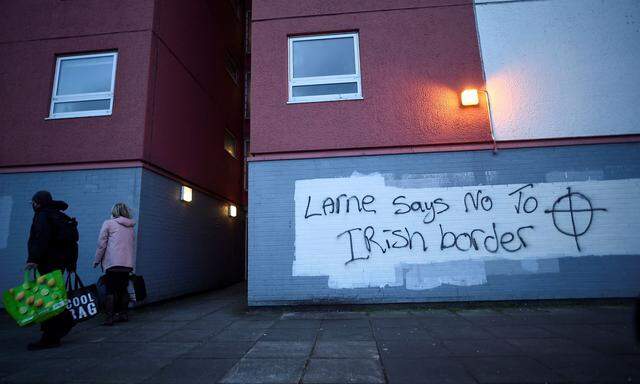 Graffiti against the Brexit border checks in relation to the Northern Ireland protocol at the harbour in Larne