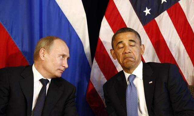 File photo of U.S. President Obama meeting with Russian President Putin in Los Cabos