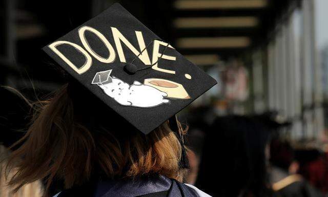 A graduate lines up for the Baruch College Commencement Exercise at the Barclay´s Center in Brooklyn, New York