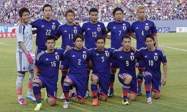 Japan's national soccer team players pose before international friendly soccer match against Zambia, ahead of the 2014 World Cup in Tampa