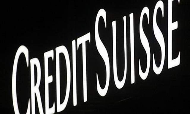A logo is seen on the facade of a Swiss bank Credit Suisse agency in Zurich