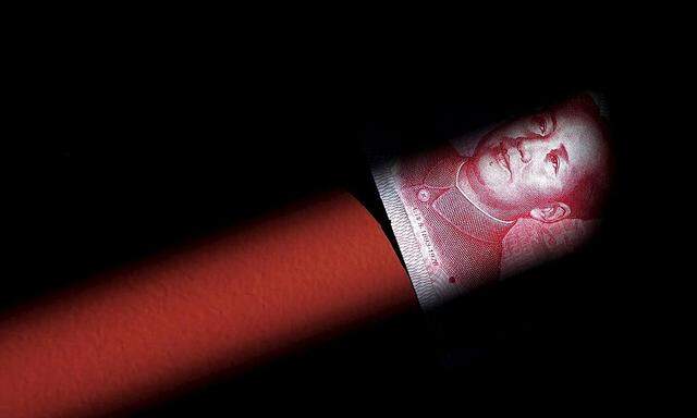 File photo of a 100 Yuan note in Beijing