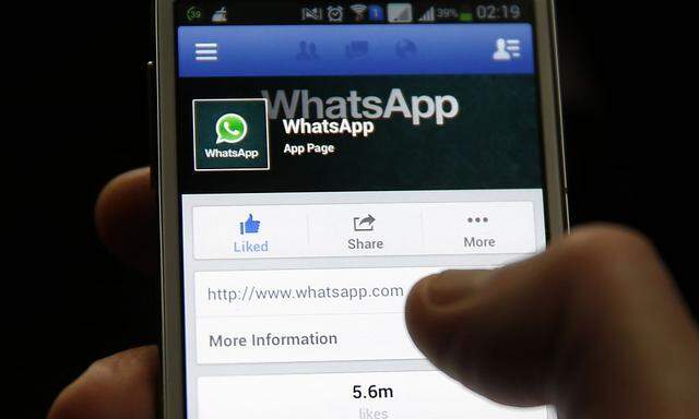 A Whatsapp App page is seen on Facebook on a Samsung Galaxy S4 phone in the central Bosnian town of Zenica