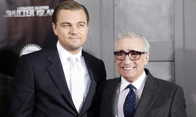 Director Scorsese poses with cast member DiCaprio as they arrive at the premiere of the movie ´Shutter Island´ in New York