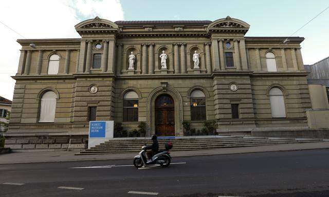A motorcyclist drives past the Kunstmuseum Bern art museum in Bern