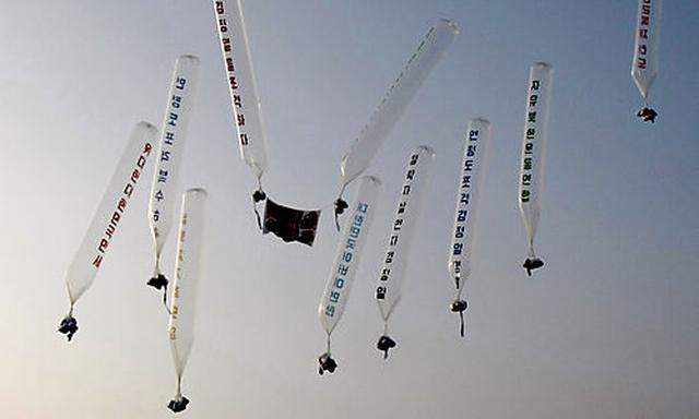 Balloons with leaflets attached to condemn North Korea, are released by Defectors from North Korea an