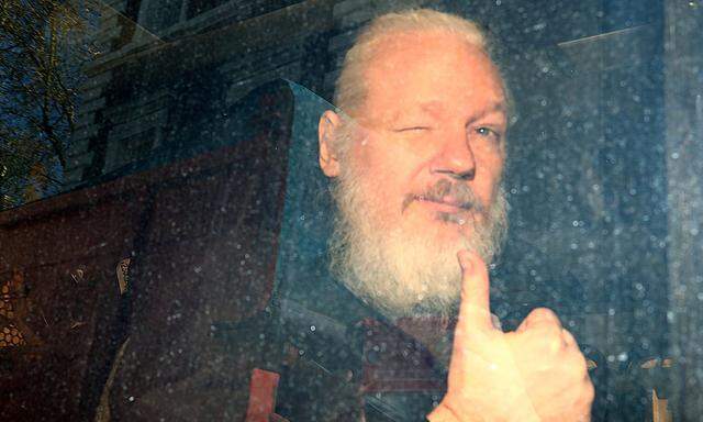 FILE PHOTO: WikiLeaks founder Julian Assange arrives at the Westminster Magistrates Court, after he was arrested  in London