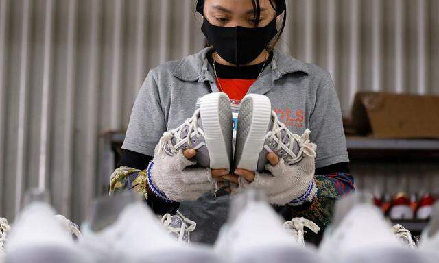Making of shoes for export at a factory in Hanoi