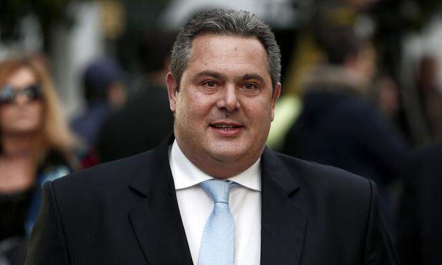 Leader of the right-wing Independent Greeks party and junior partner of the government, Panos Kammenos, arrives for a swearing in ceremony at the presidential palace in Athens