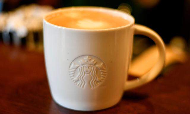 FILE PHOTO: A cup of coffee rests on a counter at a Starbucks coffeehouse in Austin, Texas