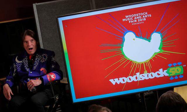 FILE PHOTO: Singer John Fogerty speaks during the announcement event for the lineup for the Woodstock 50th Anniversary concert in New York