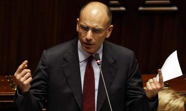 Enrico Letta gestures at the Lower house of the parliament in Rome