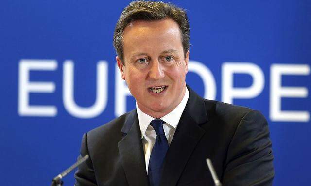 Britain's PM Cameron holds a news conference during an EU leaders summit in Brussels