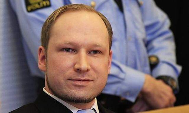 Norwegian Breivik, who killed 77 people, arrives at a court hearing in Oslo