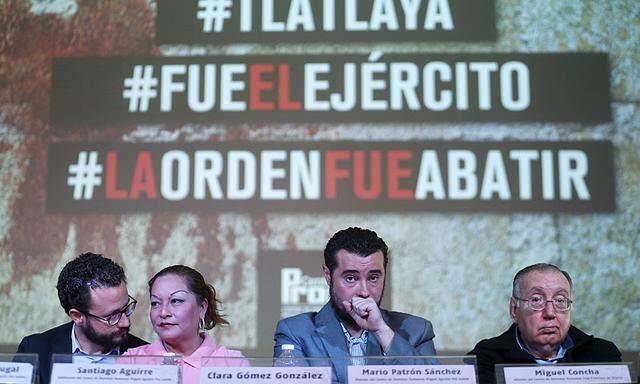 Clara Gomez Gonzalez takes part in a news conference to present a report about the Tlatlaya case, in Mexico City