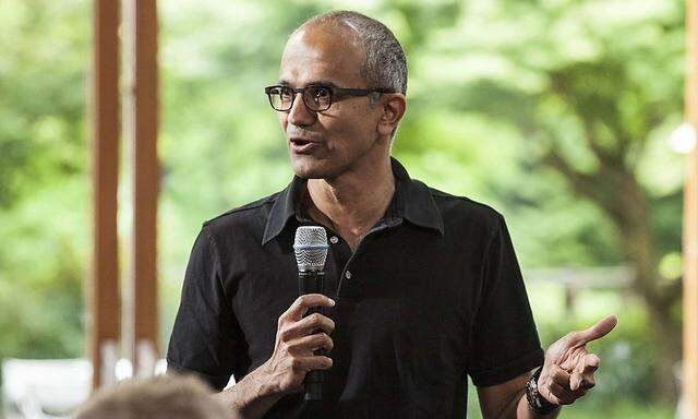 Satya Nadella, executive vice president, Cloud and Enterprise, addresses employees during the One Microsoft Town Hall event in Seattle