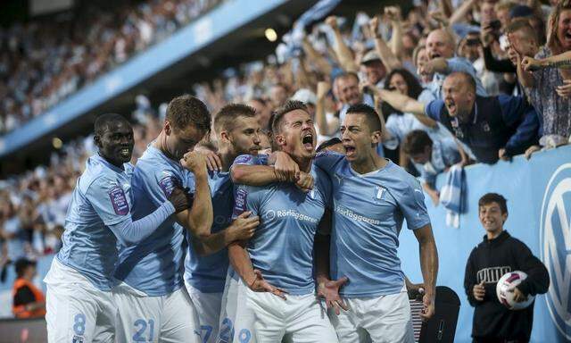Malmo's Rosenberg celebrates scoring a goal against Salzburg during their third round Champions League qualifying soccer match in Malmo 