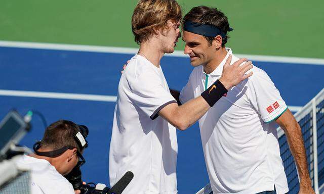 Andrej Rublew und Roger Federer.