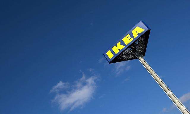 The IKEA logo is seen outside IKEA Concept Center, a furniture store and headquarters of the IKEA brand owner Inter IKEA, in Delft