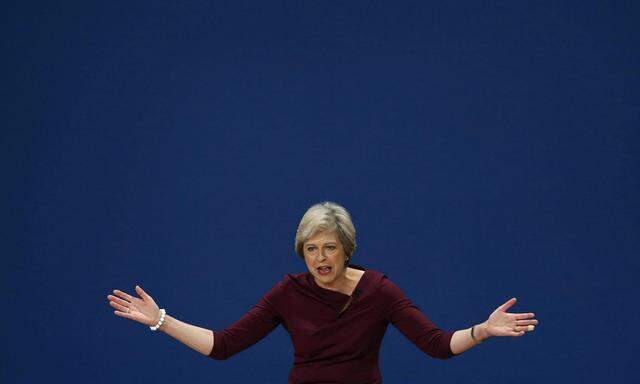 Britain´s Prime Minister Theresa May gestures after giving her speech on the final day of the annual Conservative Party Conference in Birmingham