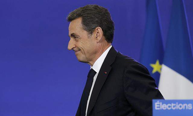 Nicolas Sarkozy, conservative UMP political party leader and former French president, attends a news conference after the close of polls in France´s second round Departmental elections of local councillors at their party´s headquarters in Paris