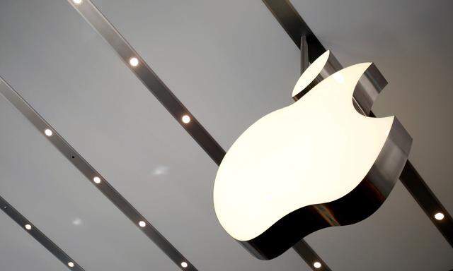 FILE PHOTO: Apple logo is pictured inside the newly opened Omotesando Apple store at a shopping district in Tokyo, Japan