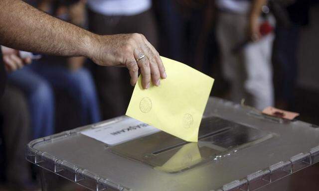 A man casts his ballot at a polling station during presidential elections in Istanbul