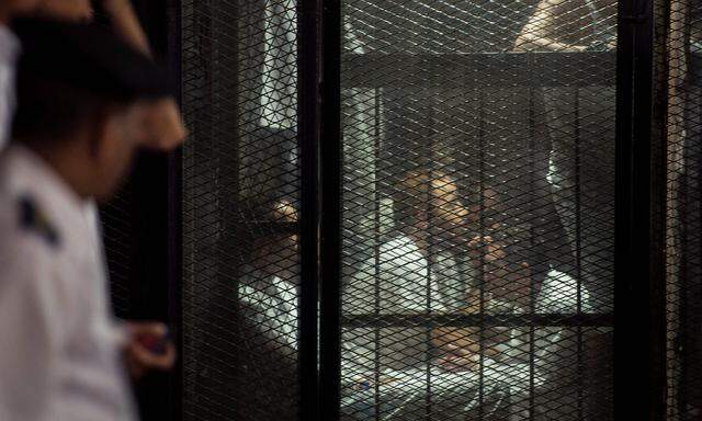 EGYPT-UNREST-TRIAL-PRESS