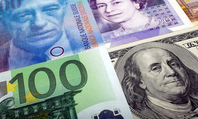 FILE PHOTO: A picture illustration of  U.S. dollar Swiss Franc British pound and Euro bank notes