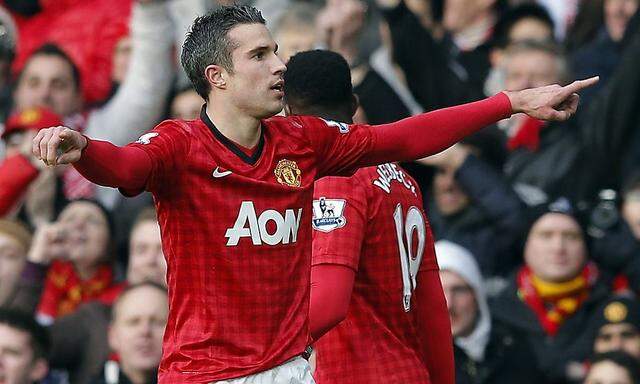 Manchester United's van Persie celebrates his goal against Liverpool during their English Premier League soccer match in Manchester