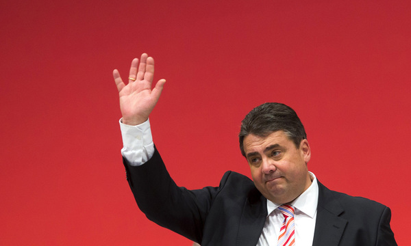 Party leader of the Social Democratic Party Gabriel waves to delegates after his speech during an SPD party congress in Leipzig