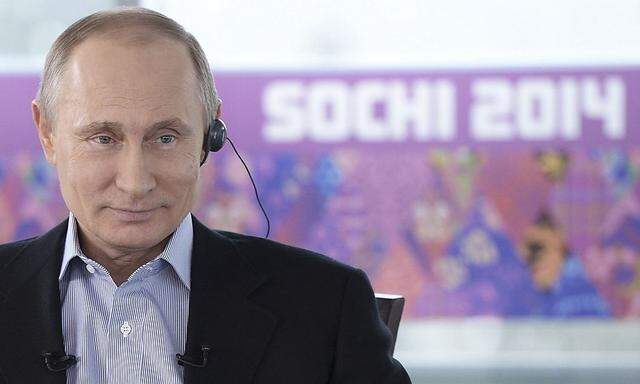 Russian President Putin attends a televised news conference in Sochi
