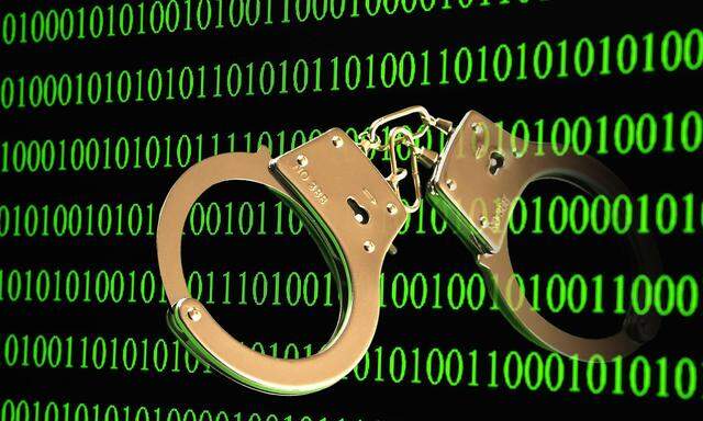 Handschellen mit Binaercode, Symbolbild Computerkriminalitaet *** Handcuffs with binary code symbol image Computer crime
