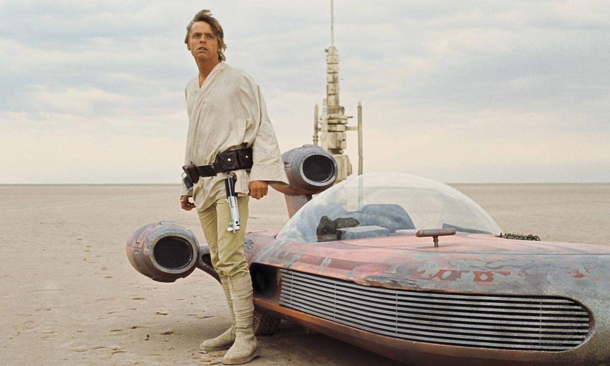 "A long time ago, in a galaxy far, far away ..." mit dieser Einblendung beginnen traditionell die Filme der Star Wars-Saga. Seit 1977 begeistert sie die Fans. Im Bild: Mark Hamill (Luke Skywalker) in "Krieg der Sterne" (1977)