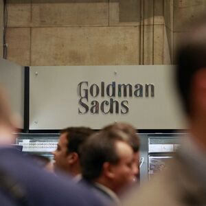 File photo of traders working on the floor of the New York Stock Exchange near the Goldman Sachs stall