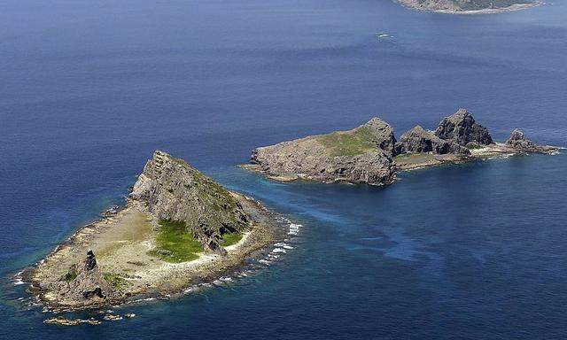 A group of disputed islands, Uotsuri island , Minamikojima and Kitakojima, known as Senkaku in Japan and Diaoyu in China is seen in the East China Sea