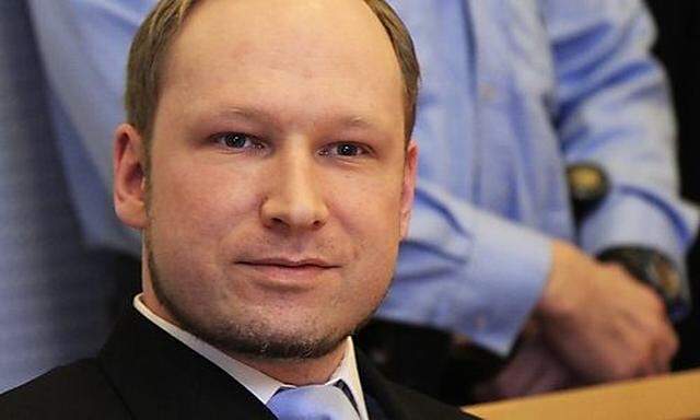 Norwegian Breivik, who killed 77 people, arrives at a court hearing in Oslo