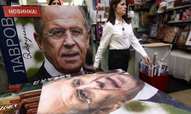 MOSCOW, RUSSIA - MARCH 20, 2020: Copies of the photographic album titled Lavrov. Emotions. Photo Album with photographs