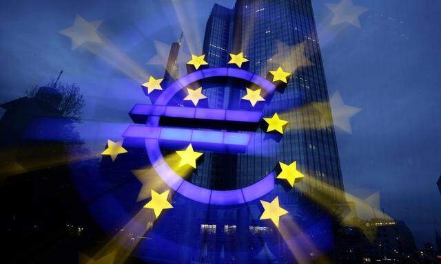 A zoom-burst image shows the illuminated euro sign in front of the headquarters of ECB in Frankfurt