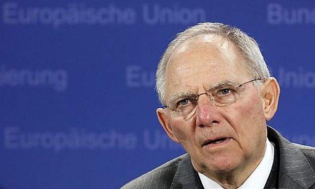 Germanys Finance Minister Schaeuble holds a news conference after a Eurogroup meeting in Brussels
