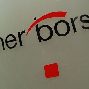 The Vienna Stock Exchange (Wiener Boerse) logo is displayed next to the company's street entrance in Vienna