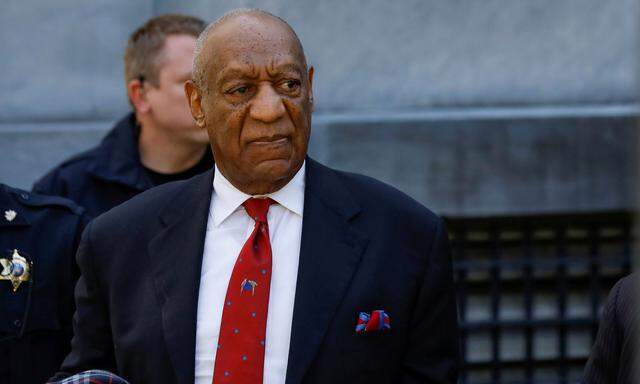 FILE PHOTO:    Actor and comedian Bill Cosby exits the Montgomery County Courthouse after a jury convicted him in a sexual assault retrial in Norristown, Pennsylvania