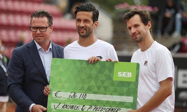 Julian Knowle of Austria and Philipp Petzschner of Germany after winning the double final match over Matwe Middelkoop and Sander Arends of Netherlands during the ATP tennis tournament  Swedish Open in Bastad