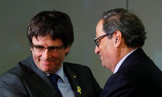 Carles Puigdemont und Quim Torra.