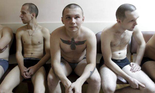 Russian conscripts wait for medical tests at a recruiting station in Stavropol