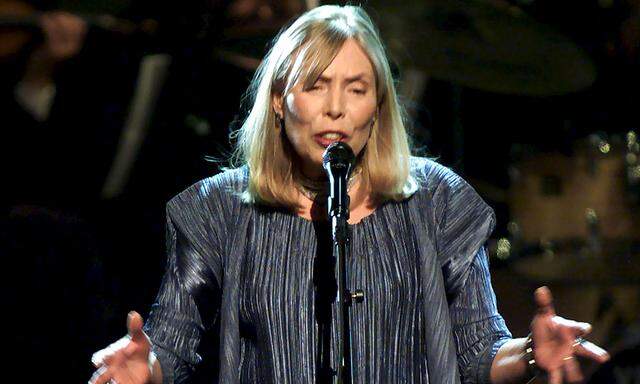 File photo of musician Joni Mitchell performing during the filming of a television tribute to her in New York