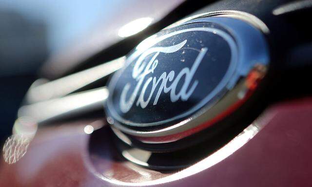 The Ford logo is seen on a car in a park lot in Sao Paulo